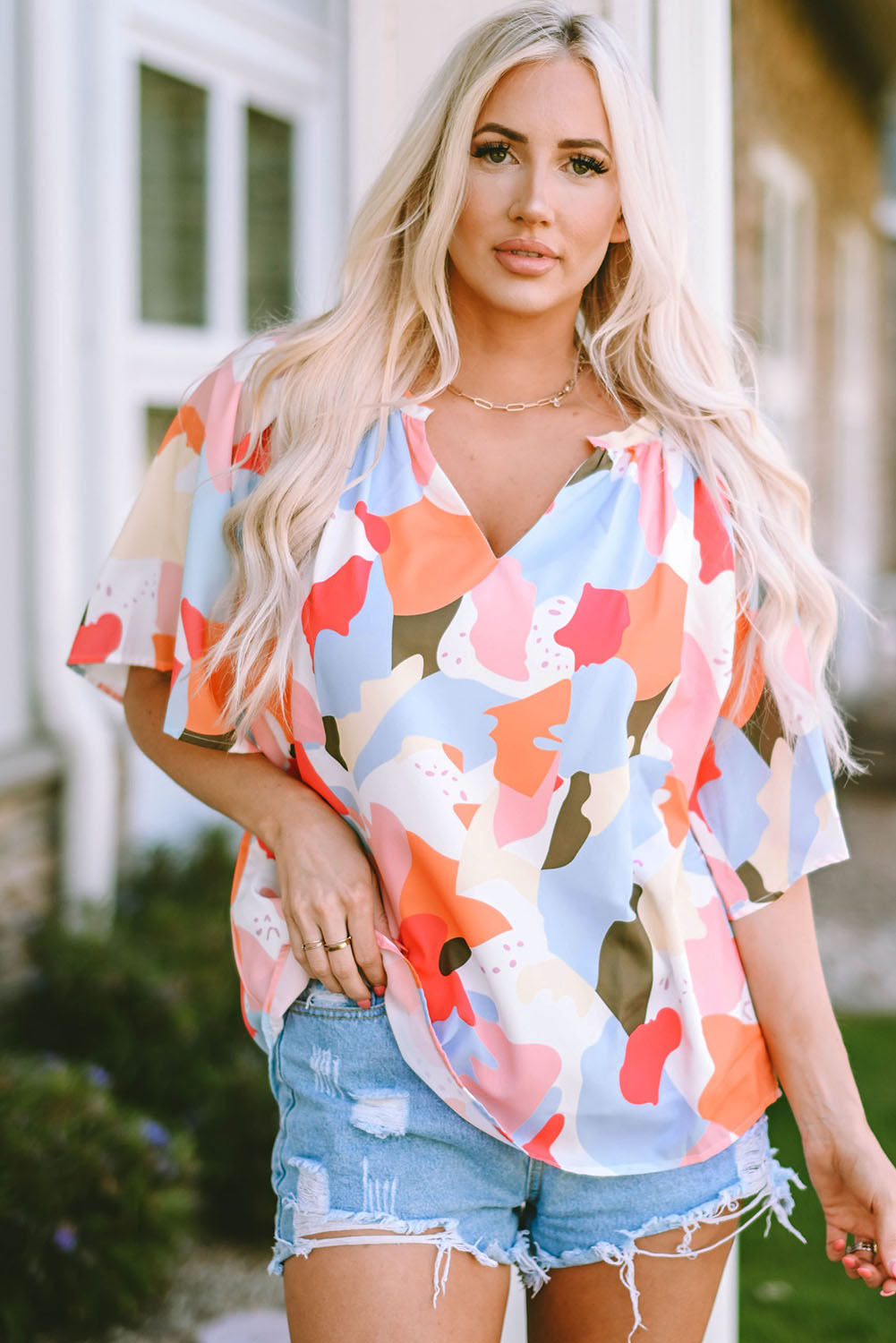 Orange Abstract Print V Neck Half Sleeve Blouse