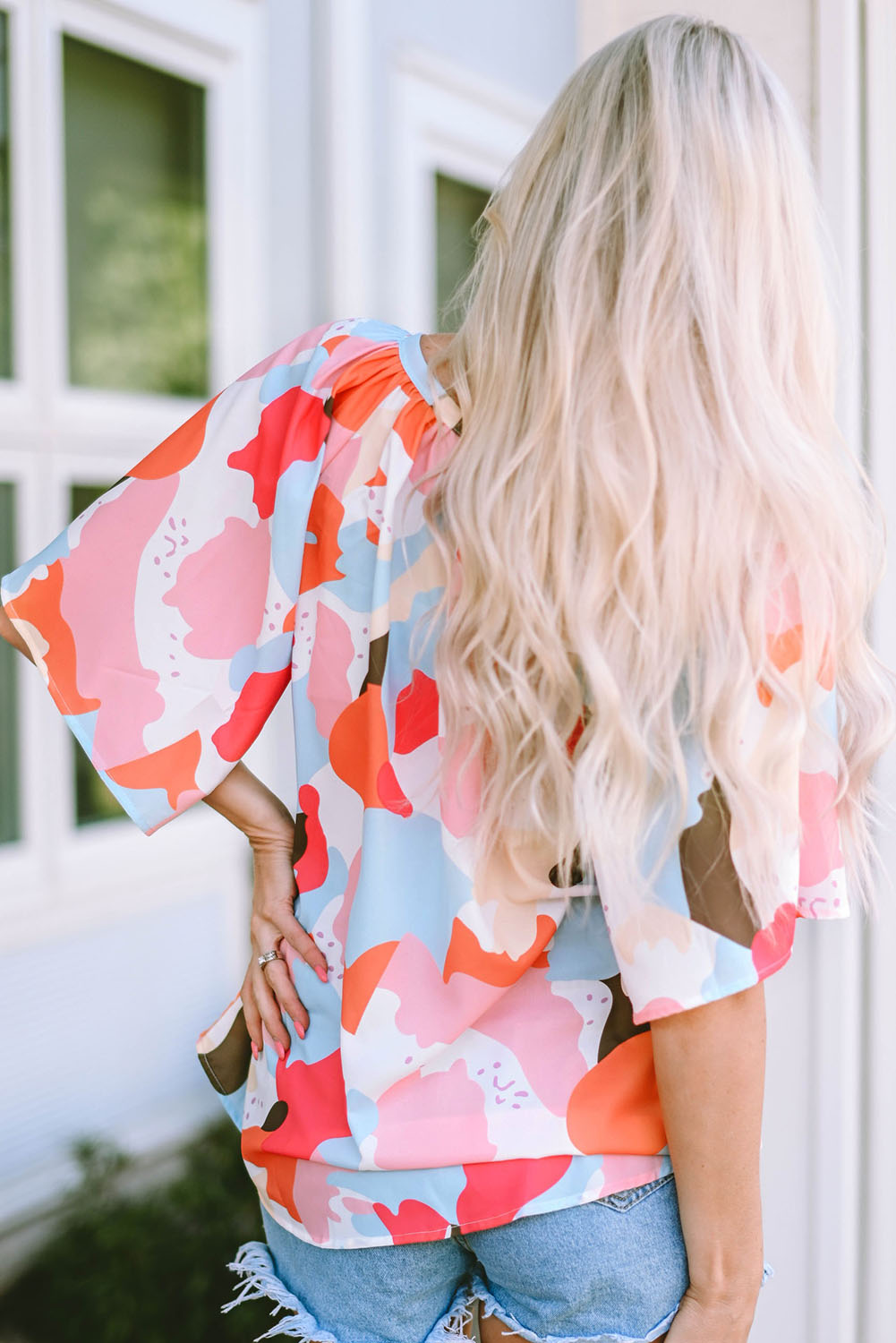 Orange Abstract Print V Neck Half Sleeve Blouse