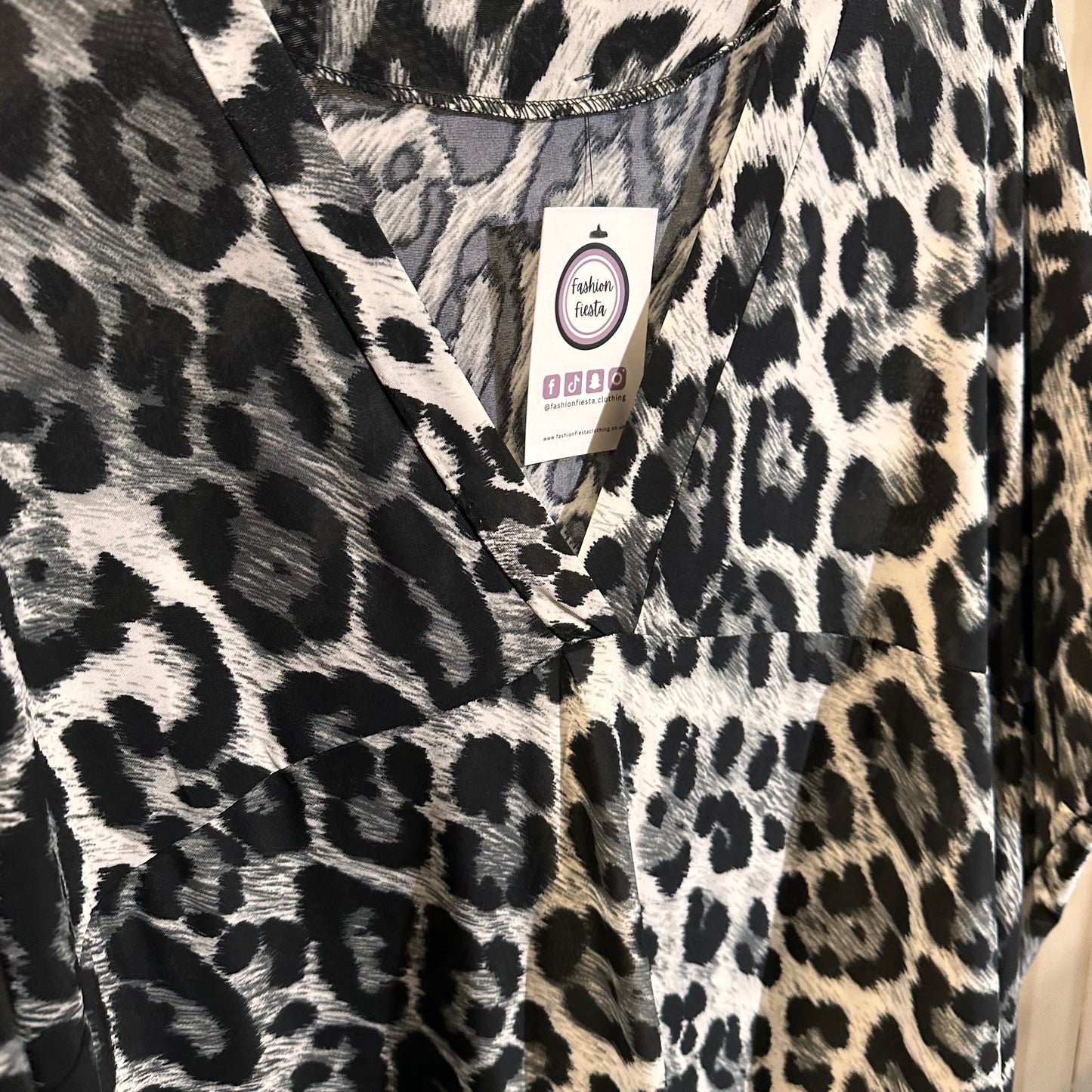 1687 - Animal Print VNeck Midi Dress
